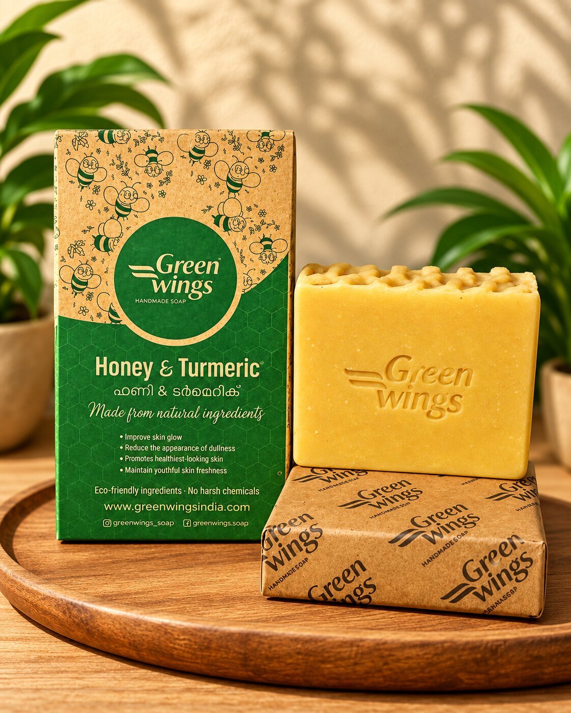 Greenwings Honey and Turmeric handcrafted soaps arranged in their botanical packaging